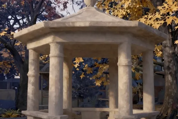Pabellón de piedra estable junto a árboles de otoño.