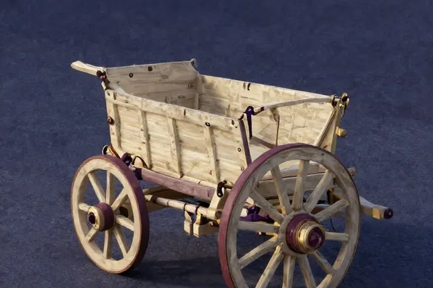 An empty chariot waits where two quiet paths join a wider road.