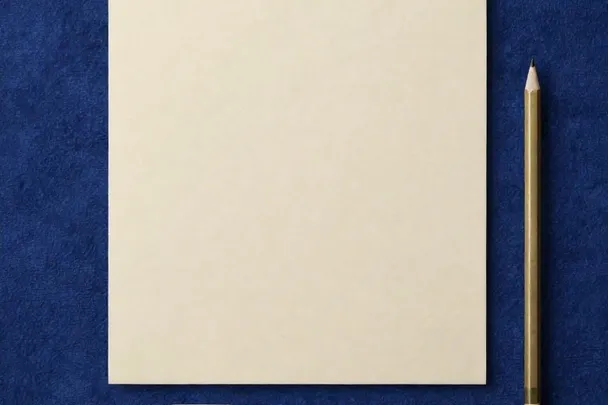 Blank tracing paper lies over a smooth board beside an unmarked straightedge.