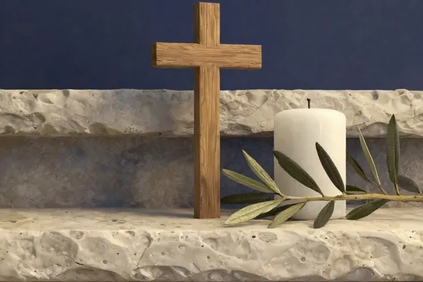 Cruz de madera sencilla junto a una vela blanca y una rama de olivo